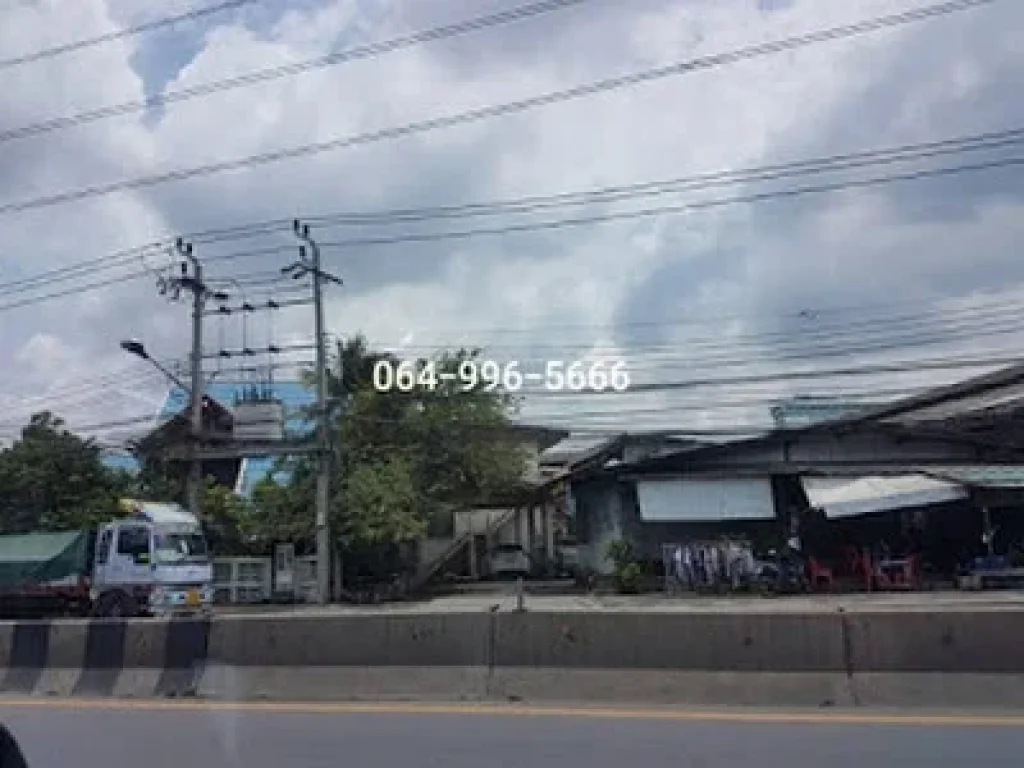 ขายที่ดินสีม่วง ติดถนนปู่เจ้า 423 วา - พร้อมบ้านพื้นไม้สัก